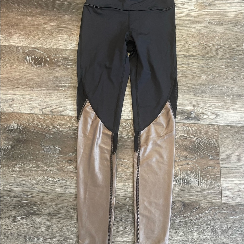 Alala Black and shiny tan Leggings NWT size XS